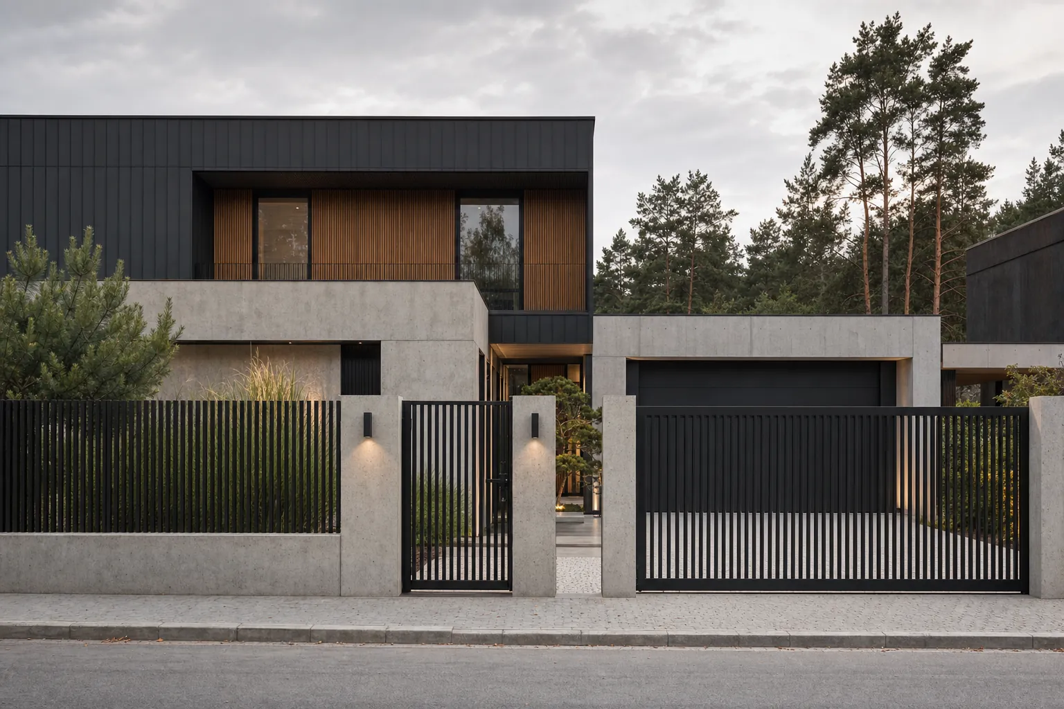 Front fence of vertical steel profiles and a sliding gate at a contemporary single-family home, dark powder coating, even spacing between bays